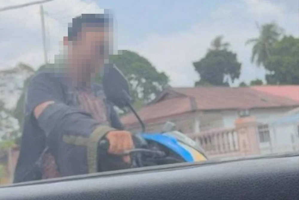 Isteri pengadu sempat merakam imej suspek dari dalam kereta.