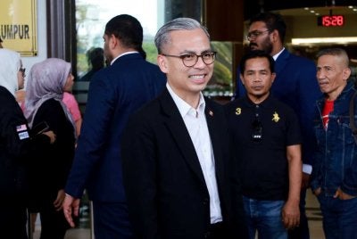 Fahmi hadir pada prosiding kes saman fitnah terhadap Papagomo atau Wan Muhammad Azri Wan Deris di Kompleks Mahkamah Kuala Lumpur. Foto Bernama