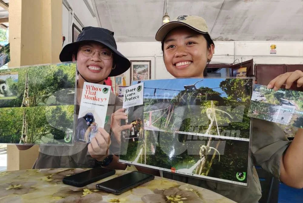 Jo Leen (kiri) bersama pembantunya menunjukkan jambatan lalulintas hidupan liar yang terdapat di Pulau Pinang, Sabah dan Kedah pada sidang akhbar pada Rabu.
