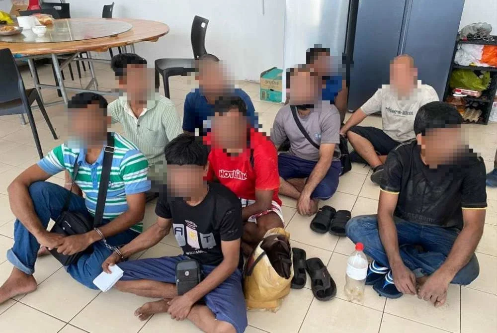 Antara warga asing yang ditahan dalam serbuan di sebuah kilang di Ijok pada Selasa. Foto: JIM