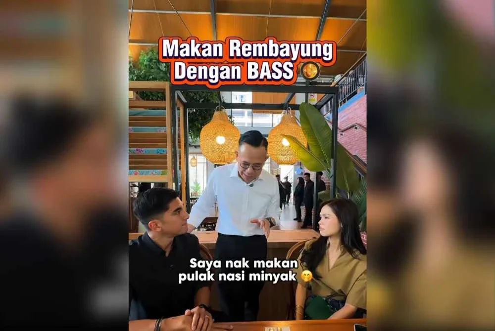 Steven (tengah) berseloroh menyatakan hasrat untuk menikmati nasi minyak Bella dan Syed Saddiq.