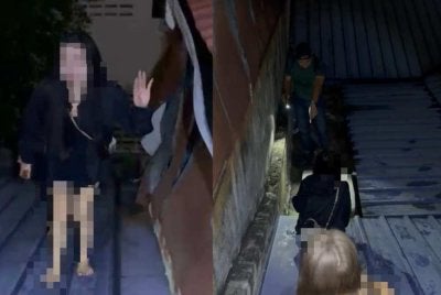GRO nekad memanjat bumbung pusat hiburan tiga tingkat di Jalan Barat untuk mengelak dicekup pihak berkuasa.