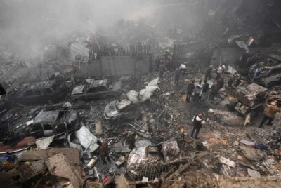 Serangan tanpa sebarang amaran itu menyebabkan kemusnahan harta benda yang dahsyat. Foto Agensi