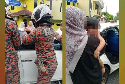 Anggota bomba menjalankan kerja mengeluarkan mangsa dari dalam kenderaan terbabit. Mangsa dilaporkan tidak mengalami sebarang kecederaan.