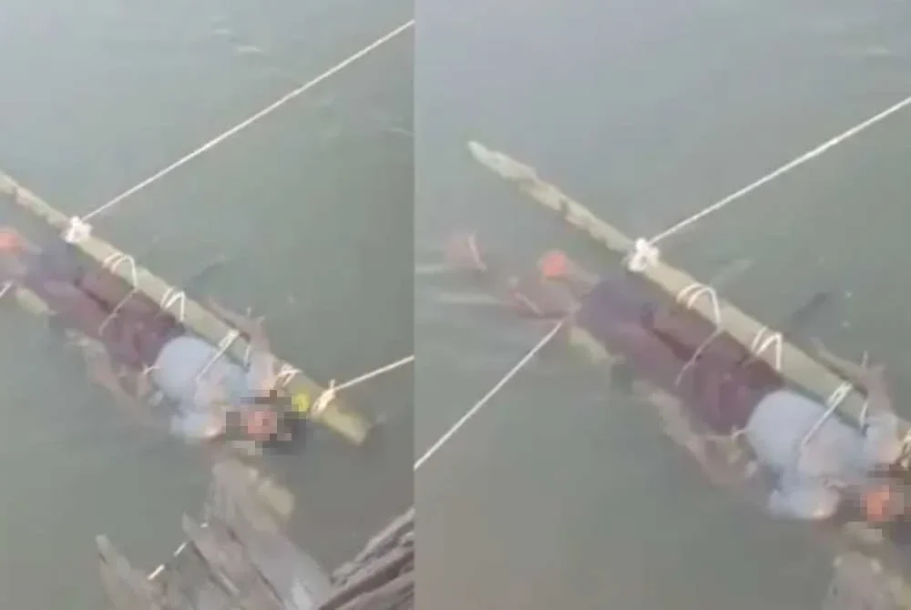 Budak berkenaan diikat dan direndam di dalam Sungai Ganges selama 12 jam sebagai ikhtiar rawatan selepas dipatuk ular berbisa. Foto Agensi
