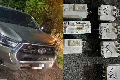 Kereta digunakan suspek dan barangan telekomunikasi yang ditemui. Foto polis