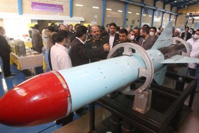 Ahmad Vahidi tengah ketika menghadiri majlis perasmian kemudahan pengeluaran peluru berpandu kruis Nasr-1 Iran pada 7 Mac 2010.- AFP