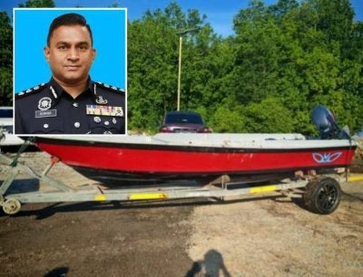 Bot fiber yang dirampas selepas polis menahan beberapa suspek dalam operasi membanteras penyeludupan migran di Tanjung Kupang. Foto kecil M Kumarasan