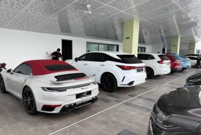 Antara kenderaan mewah yang disita SPRM untuk siasatan kes seleweng dana zakat berjumlah kira-kira RM230 juta. Foto SPRM