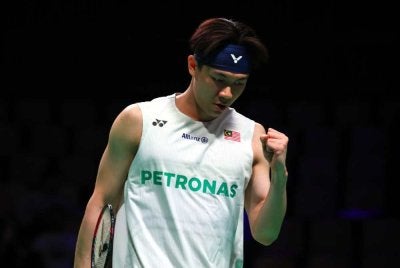 Reaksi perseorangan lelaki negara, Lee Zii Jia semasa menentang Nadeem Dalvi dari England pada aksi kumpulan B, Piala Thomas dan Uber di Forum Horsens. Foto Bernama