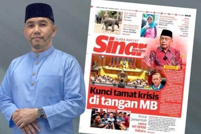 Laporan Sinar Harian dan Mohamad Hamizan (kiri)