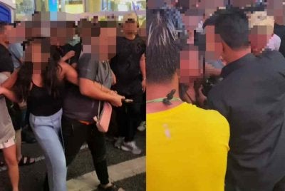 Tular video di media sosial memaparkan seorang wanita ditahan selepas didapati membawa pisau di malam penutup Rain Rave Water Music Festival 2026 di Bukit Bintang.