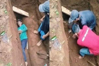 Seorang penggali kubur berdepan saat mencemaskan apabila tertimbus tanah selepas bergurau dengan berbaring mengiring seperti jenazah,