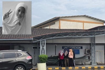 Suasana hiba menyelubungi sekitar pekarangan unit forensik Hospital Kajang di sini pada Ahad.
