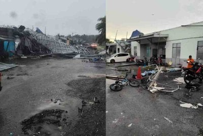 Keadaan beberapa rumah yang mengalami kerosakan selepas ribut melanda Kampung Melayu Raya Rizab 1, Jalan Tahfiz, Pekan Nenas, petang Ahad.