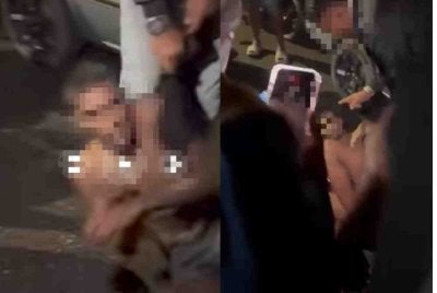 Tangkap layar video tular memaparkan seorang lelaki yang bersembunyi bawah katil dalam rumah penduduk ditahan.