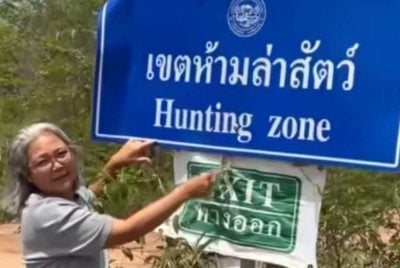Tangkap layar menunjukkan kesilapan terjemahan pada papan tanda rasmi di wilayah Sisaket, Thailand. Foto video tular