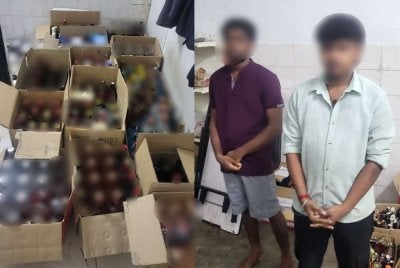 Dua lelaki warga India ditahan bersama kotak berisi minuman keras yang dirampas.
