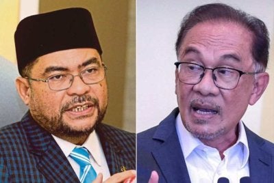 Mujahid (gambar kiri) berpandangan, analisis dalaman melibatkan 66 kerusi Parlimen oleh PKR tidak seharusnya disalah tafsir. 