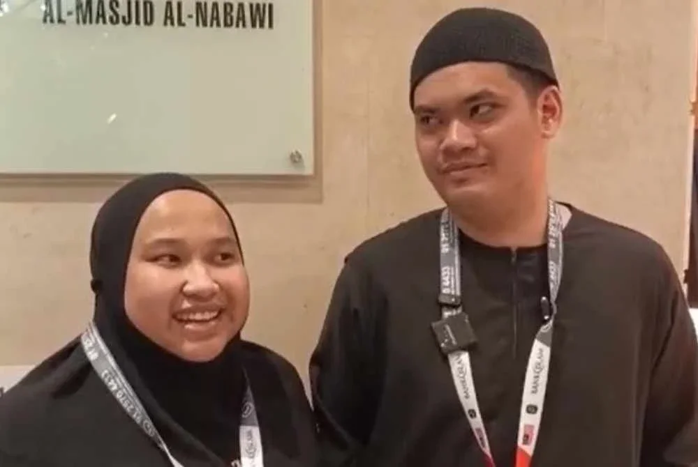 Wan Amirah dan suami, Nur Fakhri.