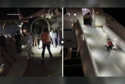 Keadaan cemas seketika dan penumpang diturunkan susulan insiden berkenaan. Foto Agensi