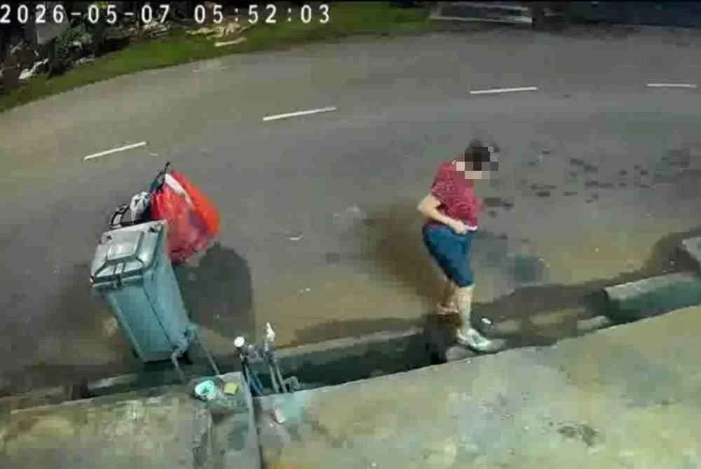 CCTV dilokasi merakam perbuatan wanita berkenaan yang didakwa kerap membuang najis. Foto: NegeriSembilanKini