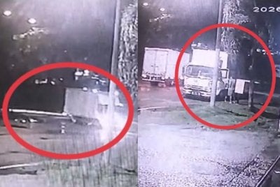 Tangkap layar rakaman CCTV memaparkan sebuah lori bonded memasuki simpang secara cuai sebelum dilanggar sebuah motosikal di Jalan Desa Serdang, Kajang, Sabtu lalu.