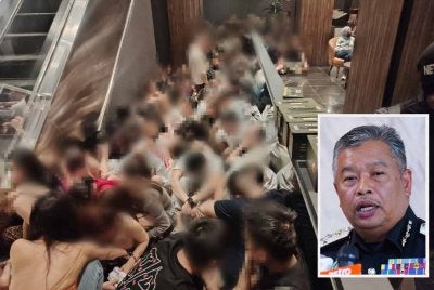 Antara warga asing yang diperiksa JIM dalam serbuan di pusat hiburan lima bintang dalam sebuah hotel di Bukit Bintang, Kuala Lumpur pada Jumaat.