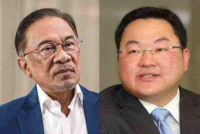 Anwar (kiri) dan Jho Low.