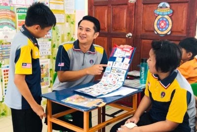 Dr Velerie (dua dari kiri) mahu mengubah persepsi masyarakat terhadap dunia pendidikan khas dan potensi murid neurodivergen.