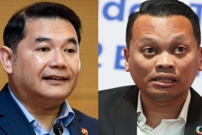 Nik Nazmi (kanan) bersama Rafizi Ramli umum keluar PKR.