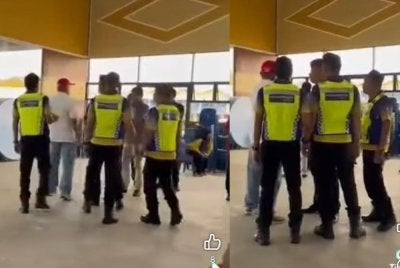 Tangkap layar video menunjukkan beberapa urus setia Program Perlis Mendengar Rintihan Rakyat dan beberapa anggota polis yang cuba mengawal keadaan tegang di Arau pada Sabtu.