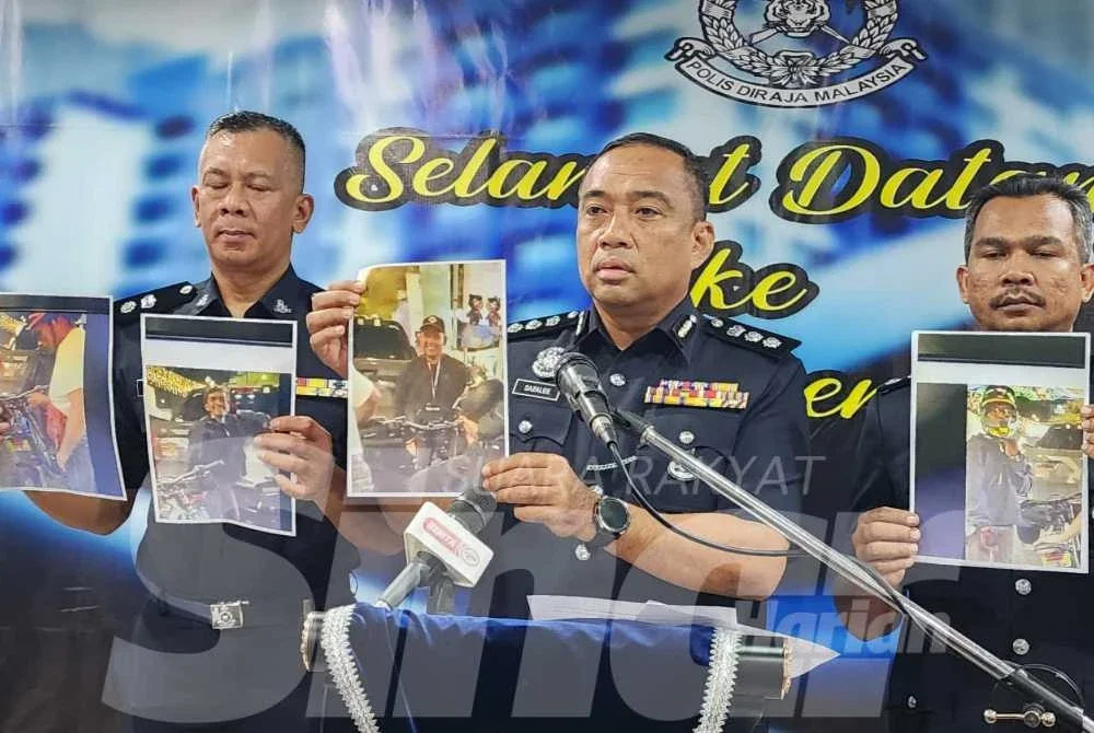 Sazalee (tengah) menunjukkan individu yang sedang dikesan bagi membantu siasatan.