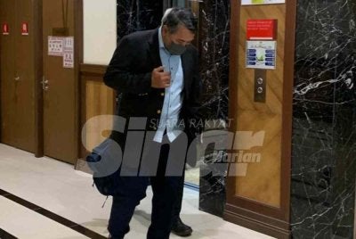 Bekas Pengarah JANS ketika hadir di Mahkamah Kota Kinabalu.
