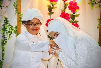Ustaz Muhammad Abdullah, 33, atau lebih dikenali sebagai Ustaz Mad Kecik selamat melangsungkan perkahwinan bersama pasangannya, Nor Suhada Mohd Azam, 26, pada Jumaat. Foto: Facebook Ustaz Muhammad Bin Abdullah - UMA