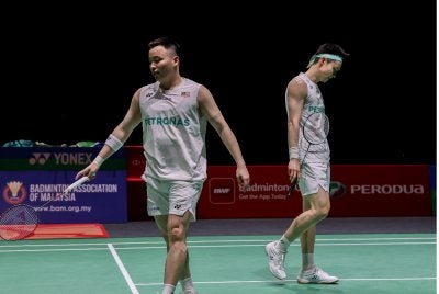 Dari kiri, Aaron- Wooi Yik kecewa selepas cabaran berakhir di tangan rakan senegara Goh Sze Fei - Nur Izzuddin dalam Malaysia Masters 2026 di Unifi Arena Bukit Jalil. Foto: Bernama