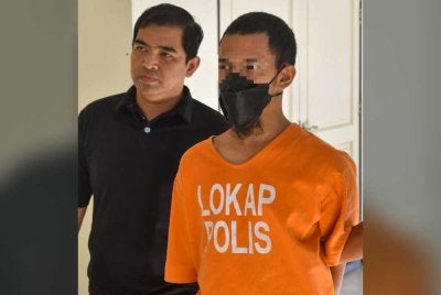 Muhammad Faiz mengaku tidak bersalah atas semua pertuduhan selepas dibacakan di hadapan Majistret Syed Farid Syed Ali. Foto Bernama