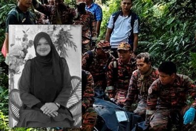Pasukan penyelamat mengangkat jenazah Nur Izzati Humaira Azizul, 19, yang ditemukan meninggal dunia selepas dipercayai tersesat ketika mendaki Bukit Changkat Asa di Hulu Selangor.