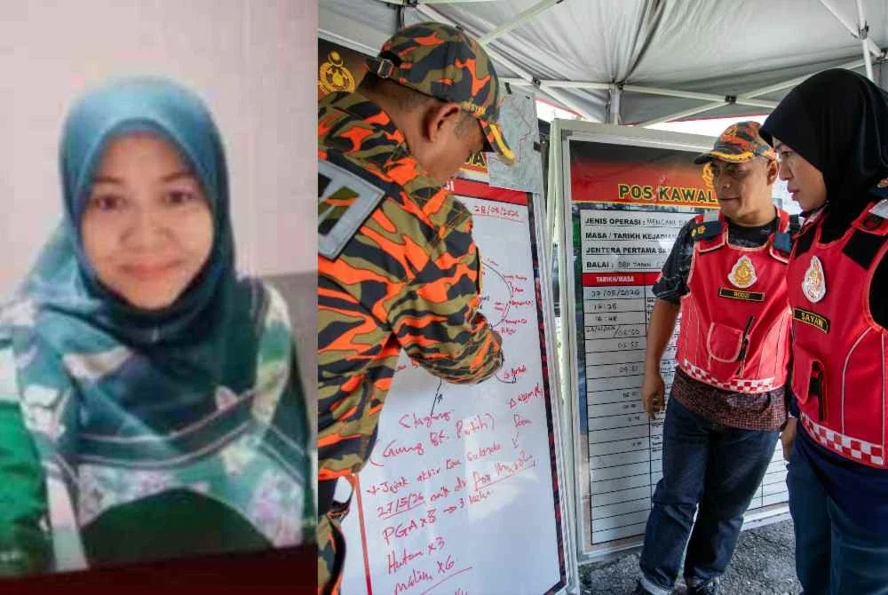 Pengarah Jabatan Bomba dan Penyelamat Malaysia (JBPM) Perak Datuk Sayani Saidon (kanan) mendengar penerangan ketika hadir pada sidang media selepas meninjau Pos Kawalan Bomba (PKB) di Pos Kuala Poh. Foto Bernama.