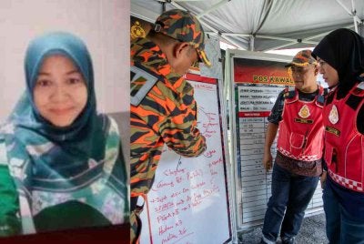 Pengarah Jabatan Bomba dan Penyelamat Malaysia (JBPM) Perak Datuk Sayani Saidon (kanan) mendengar penerangan ketika hadir pada sidang media selepas meninjau Pos Kawalan Bomba (PKB) di Pos Kuala Poh. Foto Bernama.