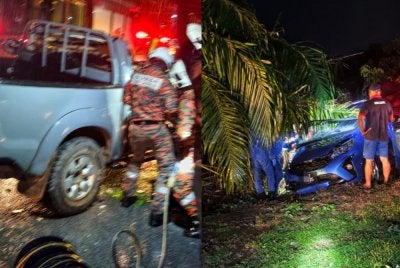 Anggota bomba dari BBP Kuala Rompin membantu mengeluarkan mangsa yang tersepit.