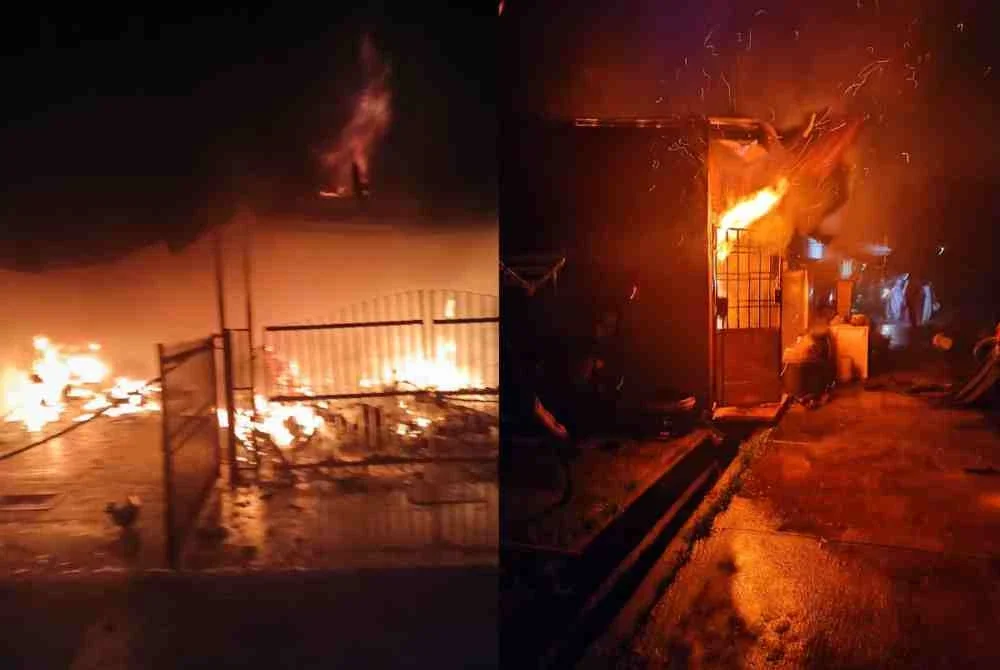 Keadaan rumah teres yang terjejas dalam kebakaran di Taman Londang, Parit Raja. - Foto JBPM Johor