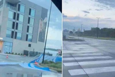 Pagar yang memaparkan logo pasukan kebangsaan Argentina telah roboh akibat ribut. Foto: Agensi