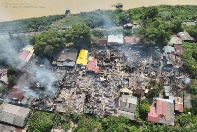 Sebanyak 15 rumah yang musnah dalam kebakaran di Kampung Cina, Gok Kapur pada Isnin.