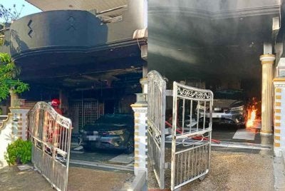Semua mangsa yang terperangkap di tingkat atas rumah bertindak keluar ke bumbung rumah sebelah sementara menunggu ketibaan pasukan bomba. Foto bomba 