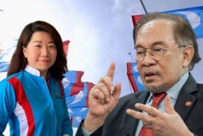 Ker Chean (kiri) dan Anwar Ibrahim.