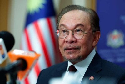 Anwar ketika sidang media selepas lawatan rasmi tiga hari ke Jepun pada Rabu. Foto Bernama