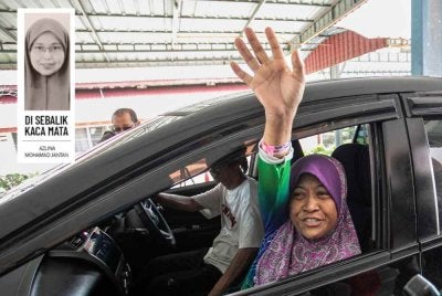 Pendaki wanita yang ditemui selamat selepas hampir dua minggu hilang di kawasan Gunung Batu Putih, Jaslinda Saludin, 49, dibenarkan keluar dari Hospital Tapah pada Selasa selepas menerima rawatan selama tiga hari. Foto Bernama