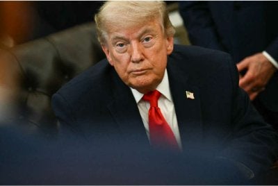 Donald Trump ketika sesi sidang media di Rumah Putih. Foto AFP