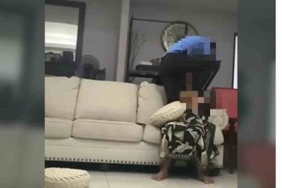 Video tular memaparkan seorang lelaki dipercayai majikan dilihat menampar dan menumbuk wanita yang sedang duduk di kerusi.